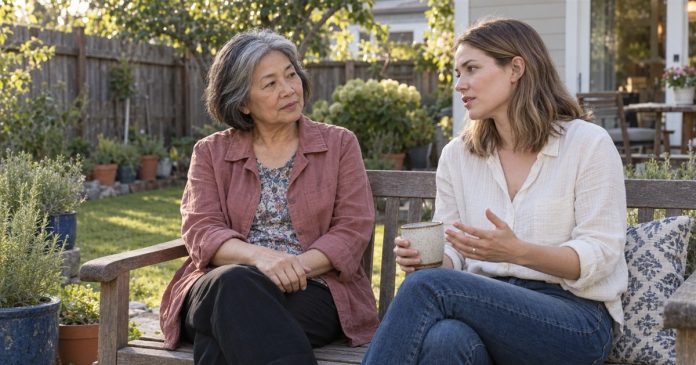 Psychic stereotypes — independent backyard conversation Two women having a thoughtful conversation on a bench in a home backyard