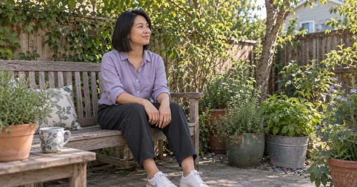 Psychic Protection Everyday Grounding Cover Woman taking an eyes-open quiet pause on a backyard bench